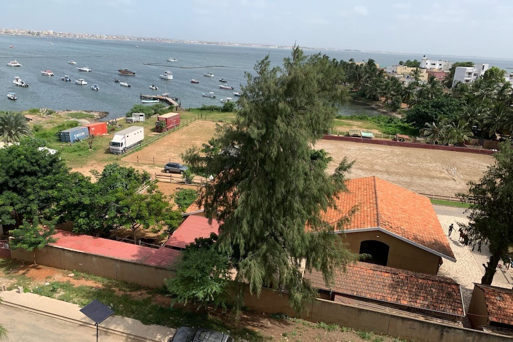 Dakar Apartment | Escape in Dakar: Bright and Airy Rental Steps from the Marina!