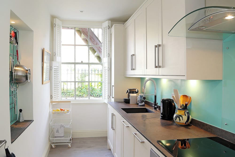 Sandgate Cottage | Relax on your balcony and enjoy the stunning, far reaching sea views overlooking Sandgate Bay.
