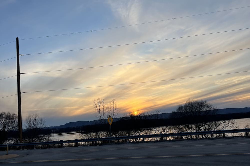 Onalaska House | Overlooking Lake Onalaska -- Queen bed + bathroom in nostalgic motel