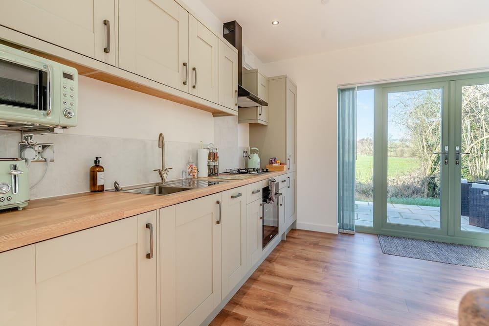 Coed-Y-Paen Cottage | Fox Acre is a stunning lodge with views over the rolling hills, perfect for a relaxing break away or