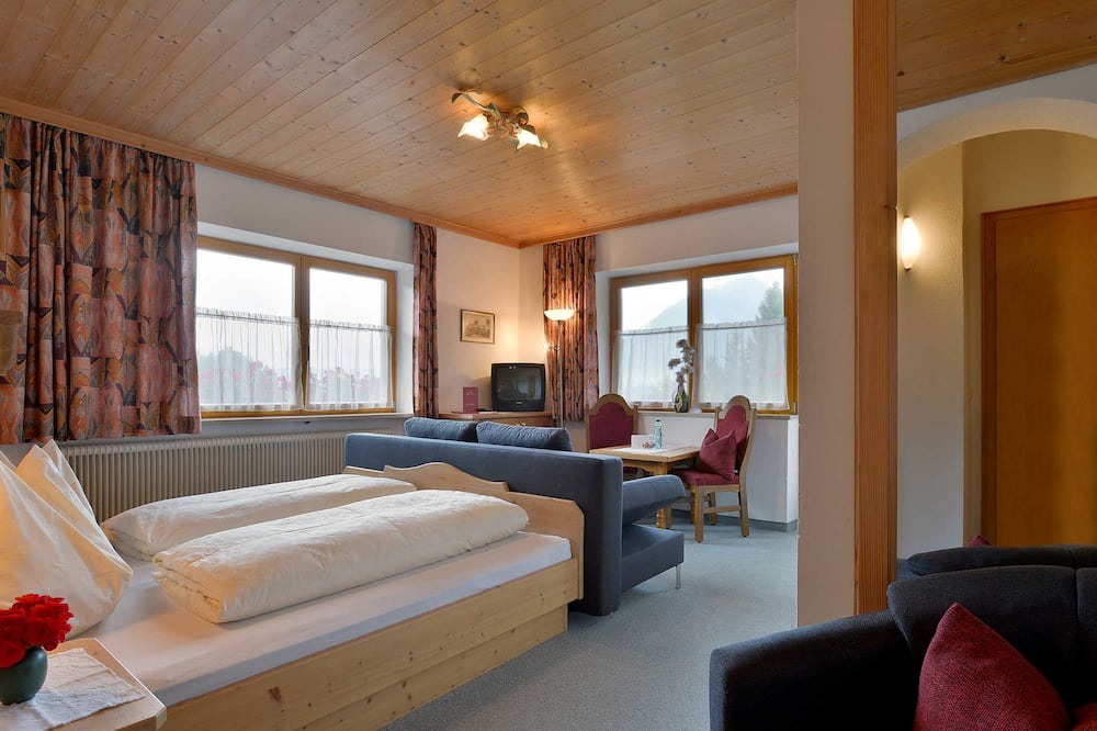 Koessen Apartment | Doppelzimmer mit Zusatzbett - Pension Gieringer