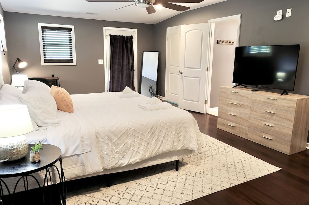 Ashley Oaks House | Family Retreat. Game room and Firepit