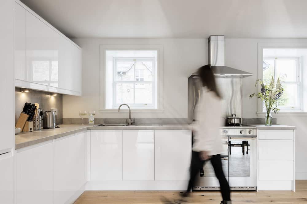 Calvine Apartment | Two-Bedroom Cottage with recreational space.