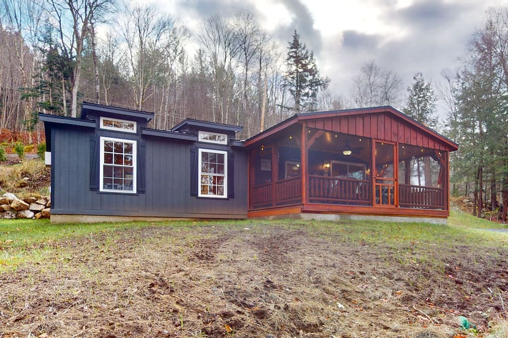 Long Lake House | Tree-lined lakefront cottage close to marina with partial AC - dog-friendly