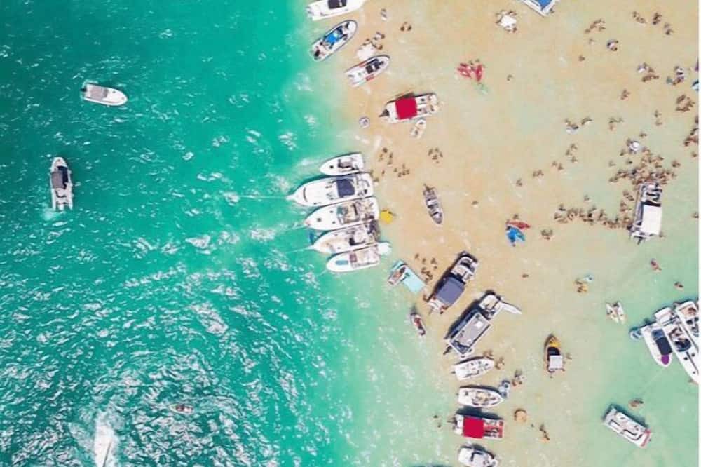 Rapid City House | 🪢 Beautiful 3BDR Home by Torch Lake Sandbar