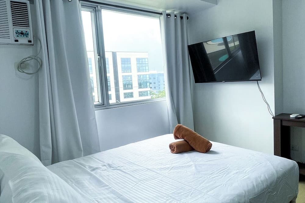 Iloilo Condo | Warm Urban Studio with modern design