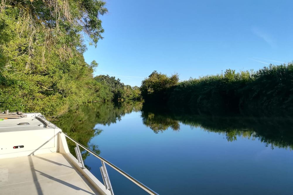 Bellegarde Boat Rental | Boat 'Odyssey Croisieres' with Lake View and Air Conditioning