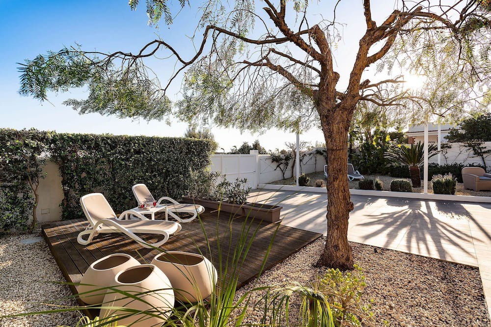 Reitani House | My Rental Homes - Apartment Ninfa with parking space and private outdoor area