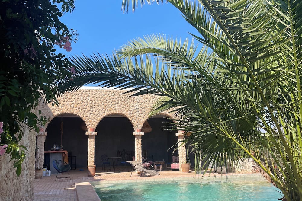 Afrate Haissoun Villa | Villa M'Birika - with large swimming pool surrounded by olive and eucalyptus trees.