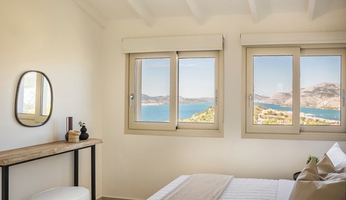 Panoramic Two-Bedroom Residence with Sea View
