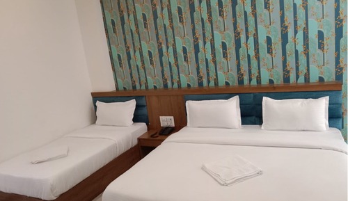 Deluxe Triple Room