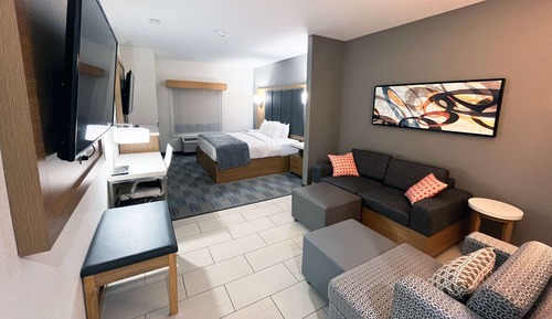 Suite, 1 King Bed with Sofa bed (2 TVs)