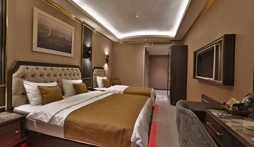 Deluxe Triple Room