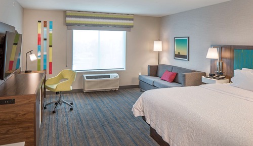 Room, 1 King Bed with Sofa bed, Refrigerator & Microwave