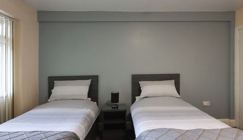 Standard Twin Room, 2 Twin Beds, Shared Bathroom