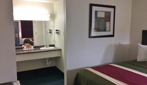 Standard Room, 1 King Bed, Smoking, Refrigerator & Microwave