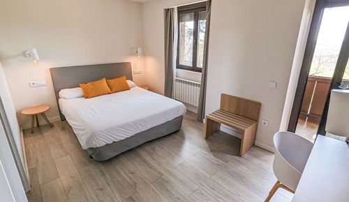 Habitación superior con balcón