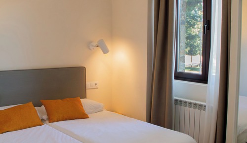 Habitación superior con terraza, dos camas