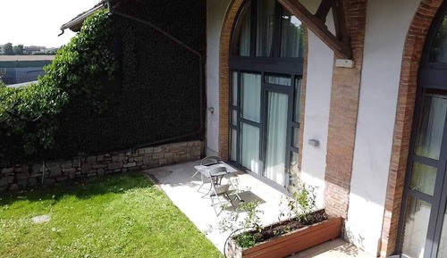 Camera Tripla con giardino