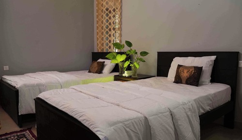 Deluxe Room, Multiple Beds, Non Smoking, Private Bathroom