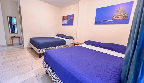 Exclusive Quadruple Room, 2 Double Beds, Balcony, Ocean View