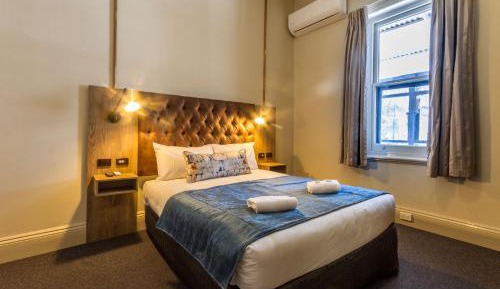 Queen Room with Shared Bathroom