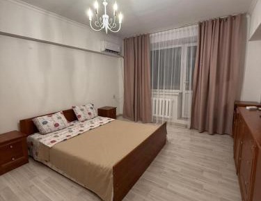 One-Bedroom Apartment with Balcony and City View