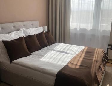 One-Bedroom Apartment with Balcony and Mountain View  