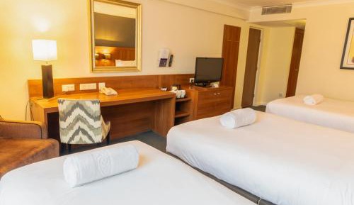 Standard Room with Two Double and One Single Bed
