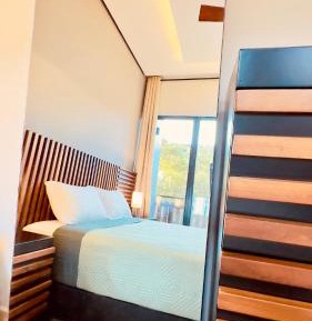 One-Bedroom Apartment with Balcony and Water View