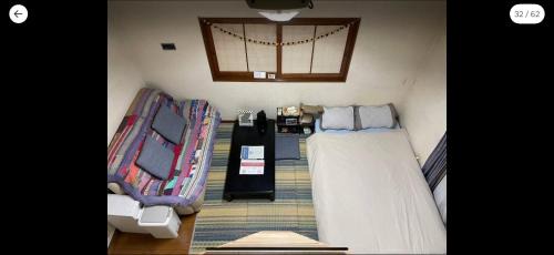 Triple Room with Shared Bathroom