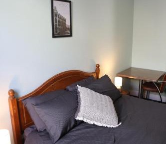 Queen Room with Shared Bathroom