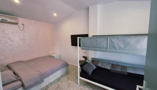 Quadruple Room with Shared Bathroom