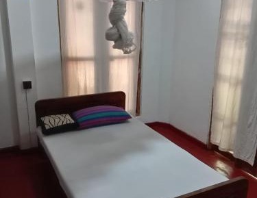 Single Bed in Dormitory Room
