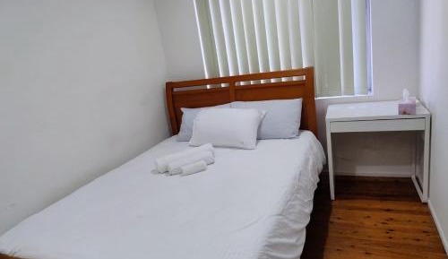 Queen Room with Shared Bathroom