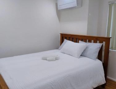 Queen Room with Shared Bathroom