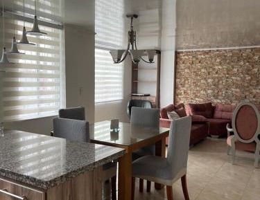 Three-Bedroom Apartment with Balcony
