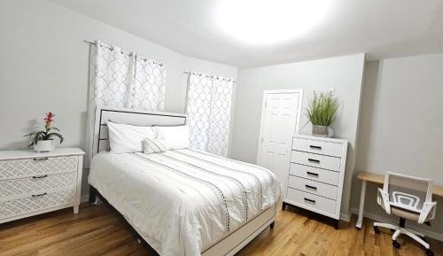 Queen Room with Shared Bathroom