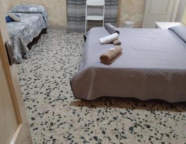 Quadruple Room with Private Bathroom