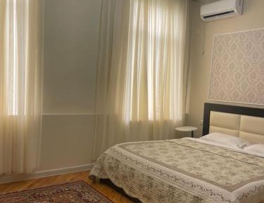 Queen Room with Shared Bathroom