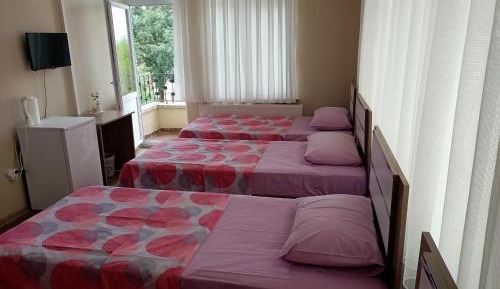 Quadruple Room with Shared Bathroom