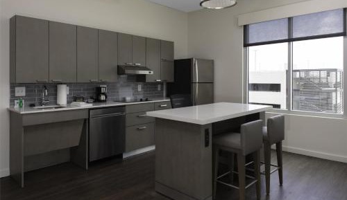 One Bedroom Kitchen Suite with Two Queen Beds and Sofa Bed