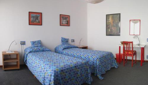 Quadruple Room with Shared Bathroom
