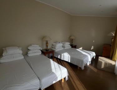 Quadruple Room with Shared Bathroom