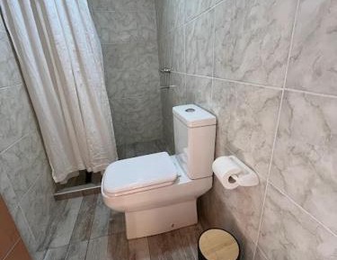 Quadruple Room with Private Bathroom