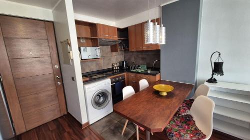 One-Bedroom Apartment with Balcony and City View