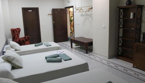 Quadruple Room with Shared Bathroom