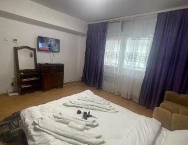 One-Bedroom Apartment with Balcony and City View