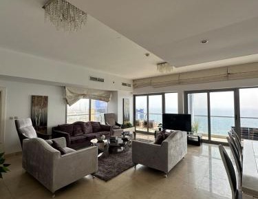 Three-Bedroom Apartment with Sea View