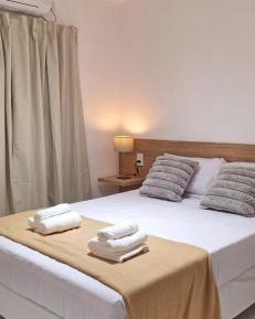 One-Bedroom Apartment with Balcony and City View